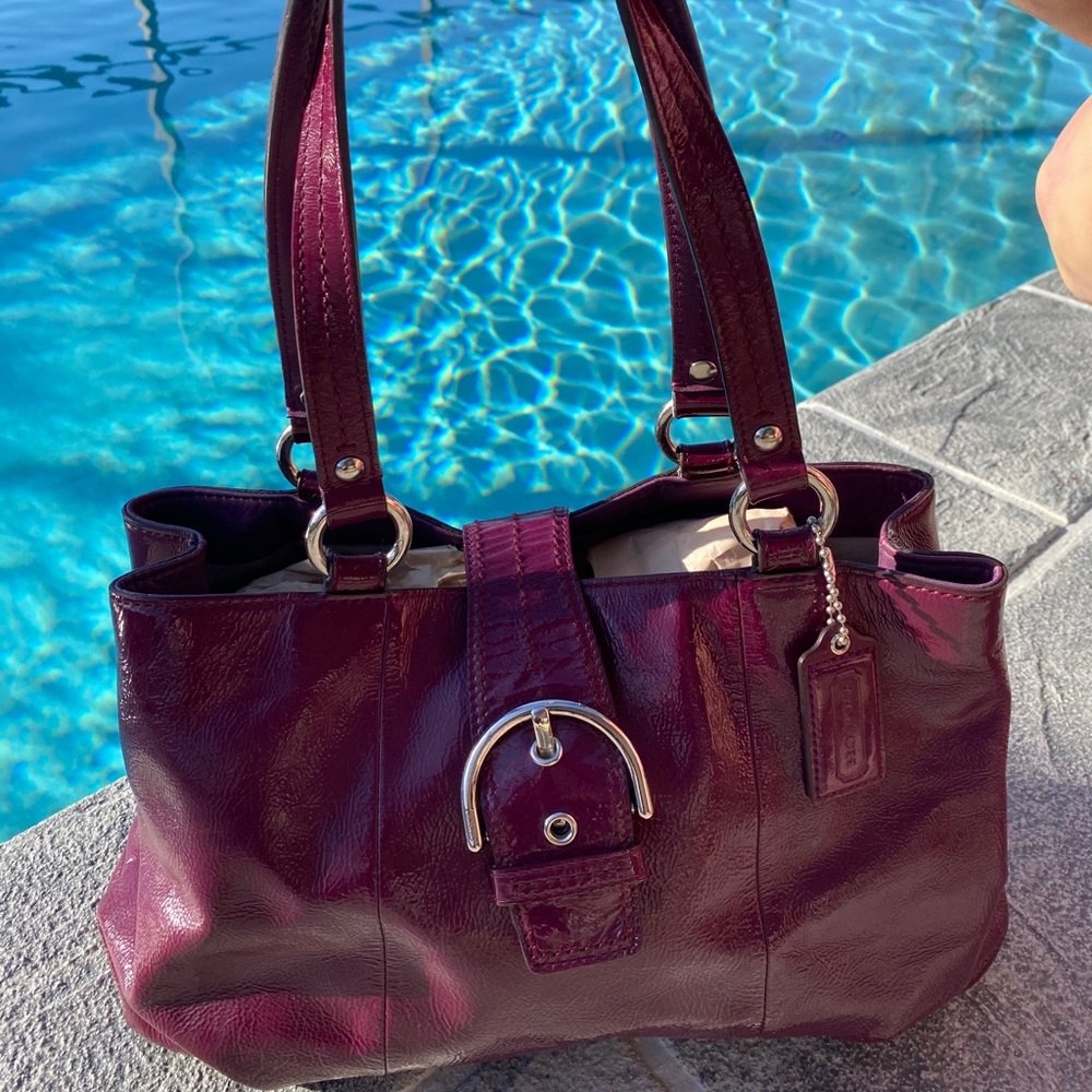 Coach plum  purple patent leather purse